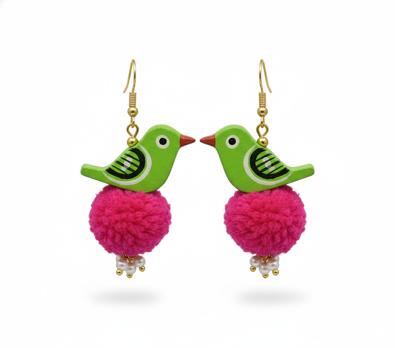 Pair of earrings with green bird and pink pom-pom design on a white background
